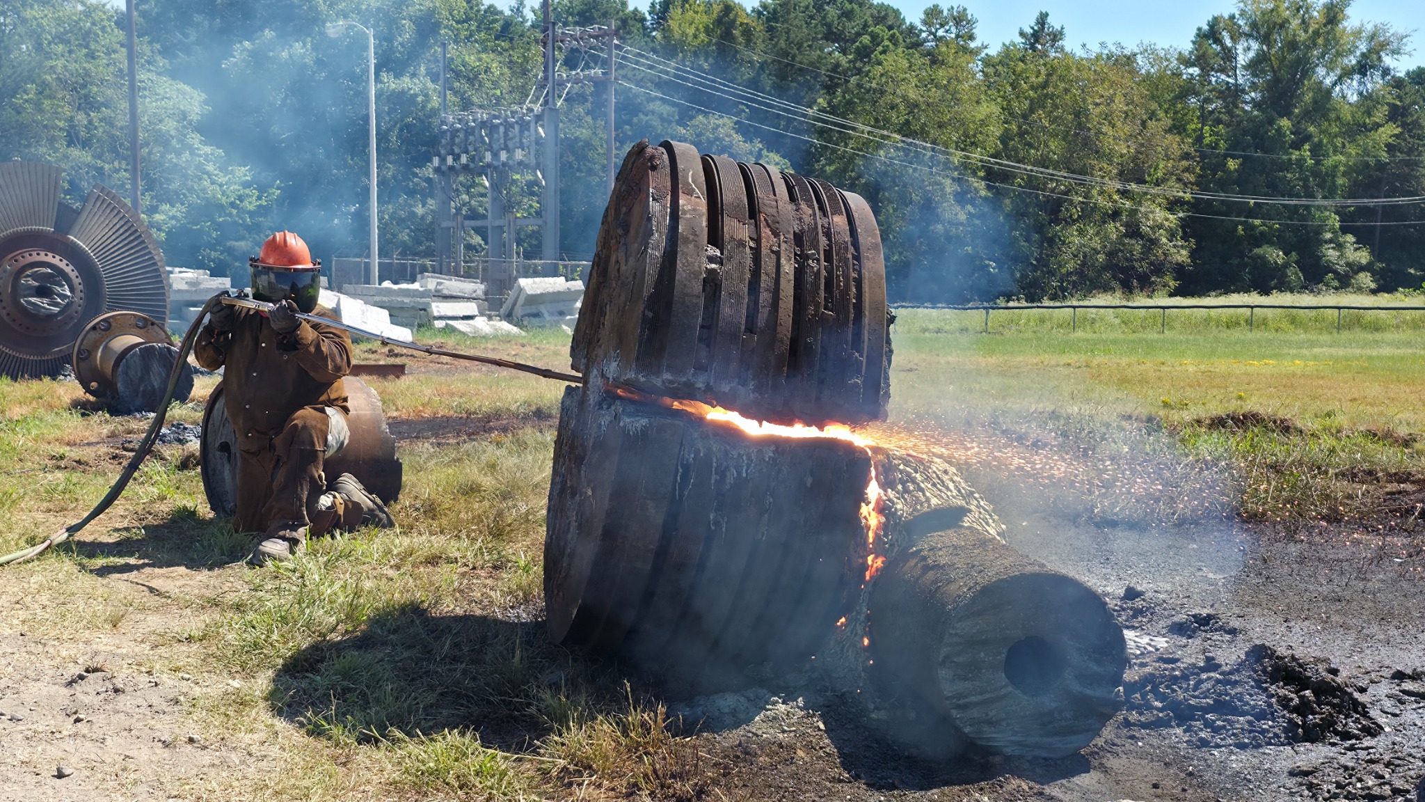 Torch operator cutting a rotor